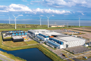 Data center developers must take into account power and water resources when evaluating sites. This aerial view shows the wind turbines near the Google Data Center in Eemshaven, Netherlands. (Image provided courtesy of Google)